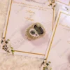 Close-up of sparkling rhinestone digital tally counter on card