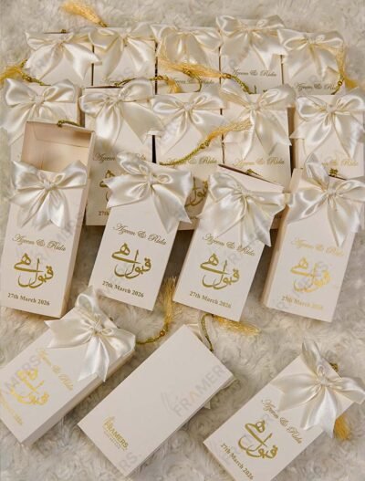 Gold foil Qubool Hai calligraphy on tall bid boxes sleeve